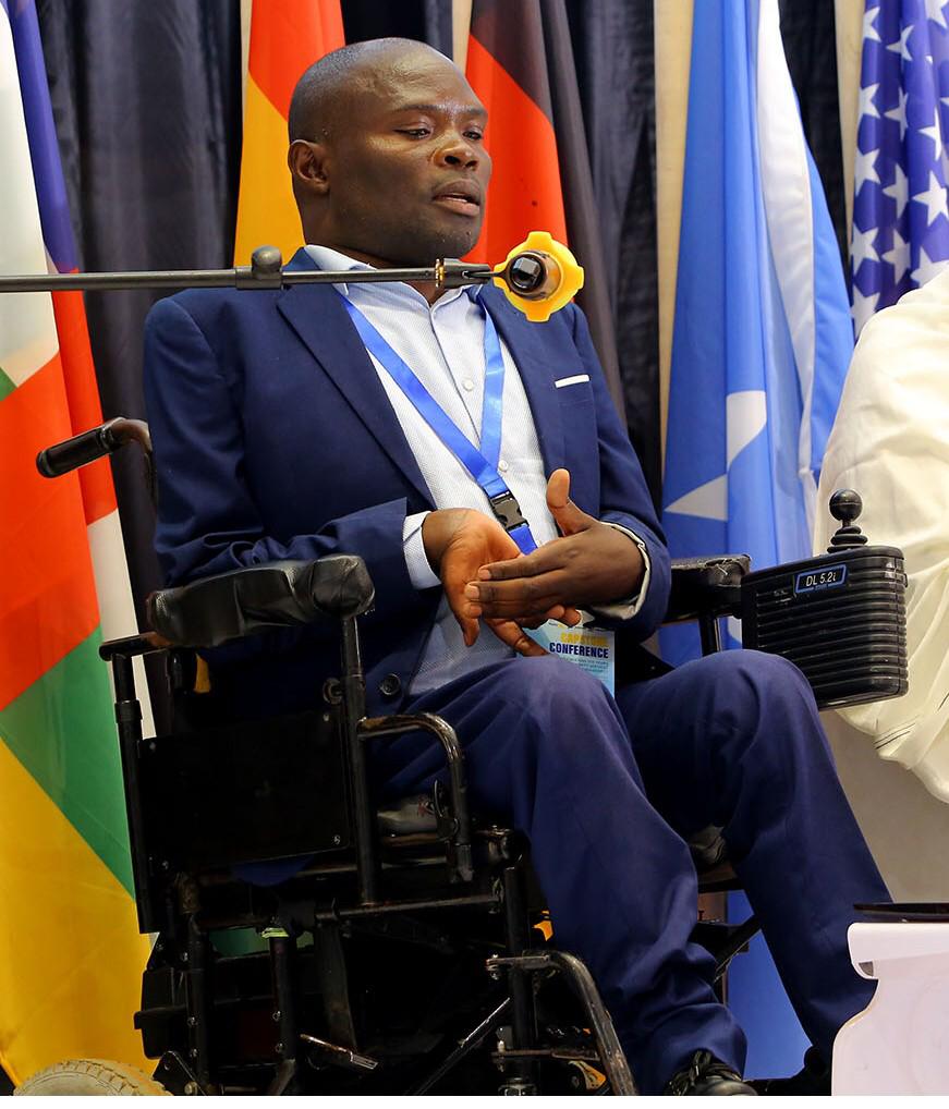 Kasule presenting at Rotary peace